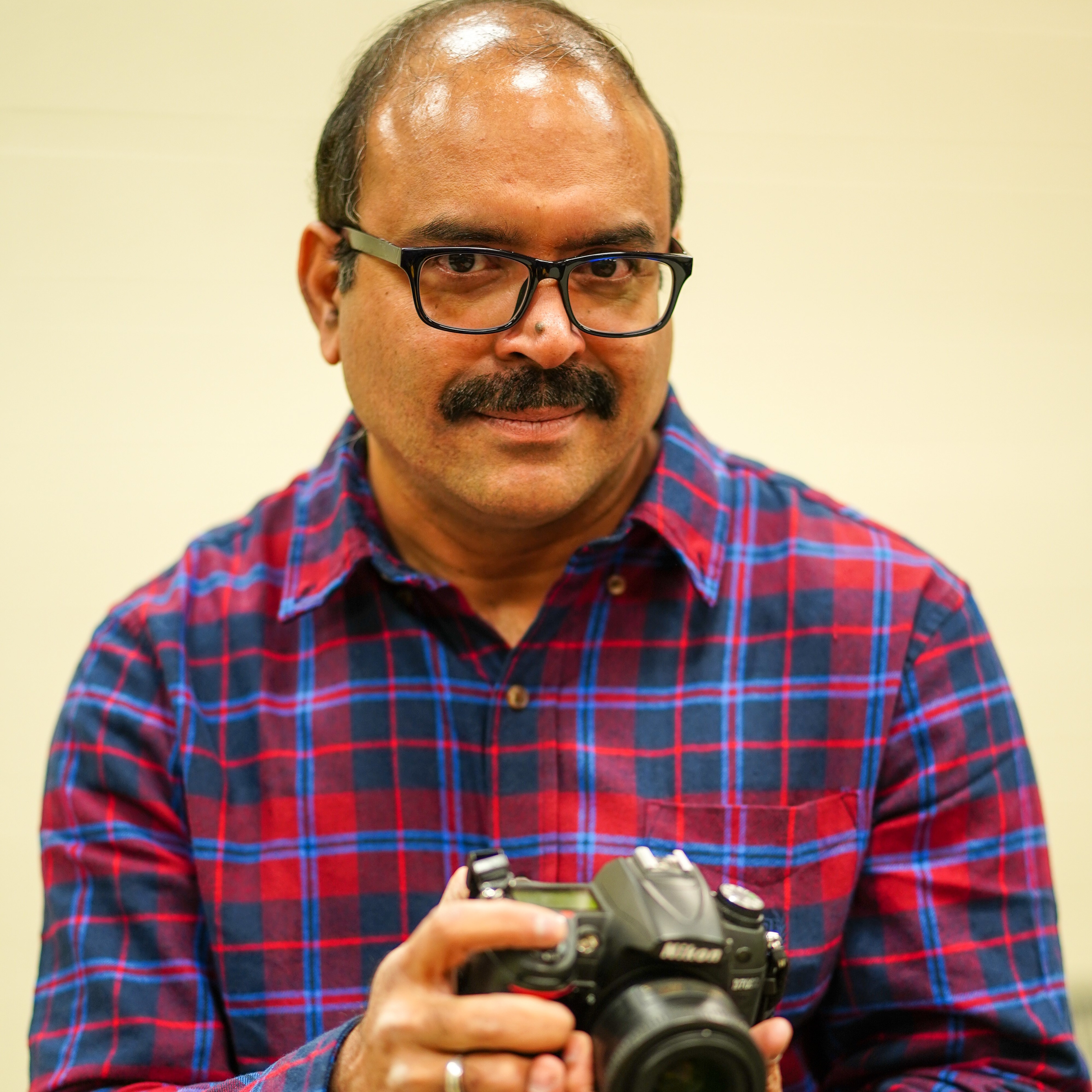 Headshot of a professional photographer